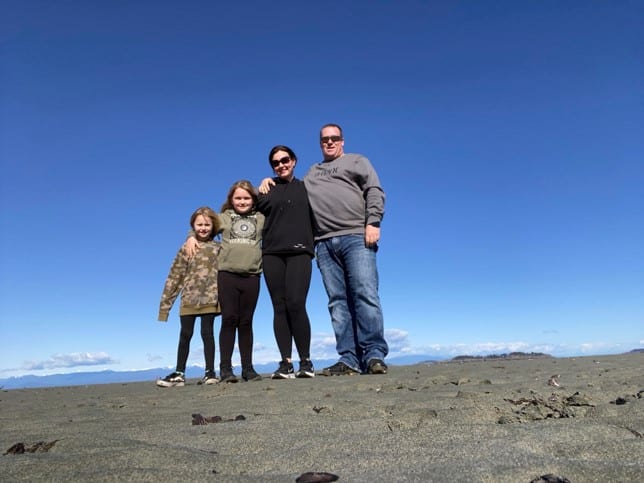 Christine and her family at the beach