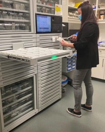 Sheri opening the Omnicell machine