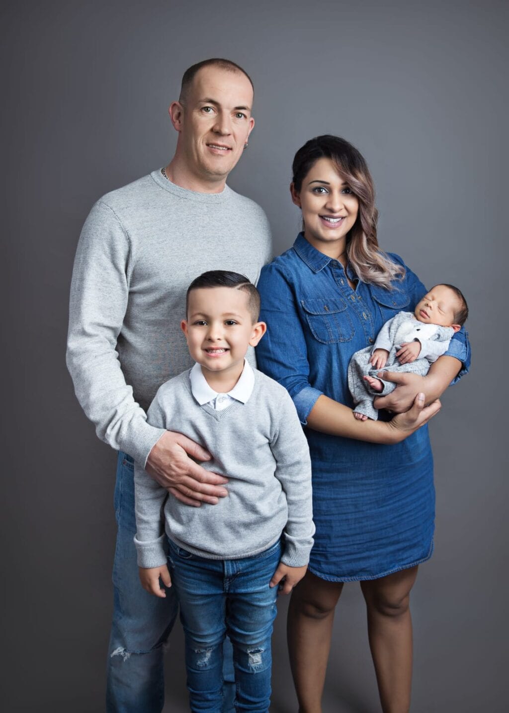 Gurpreet and her family, happy and thriving 
