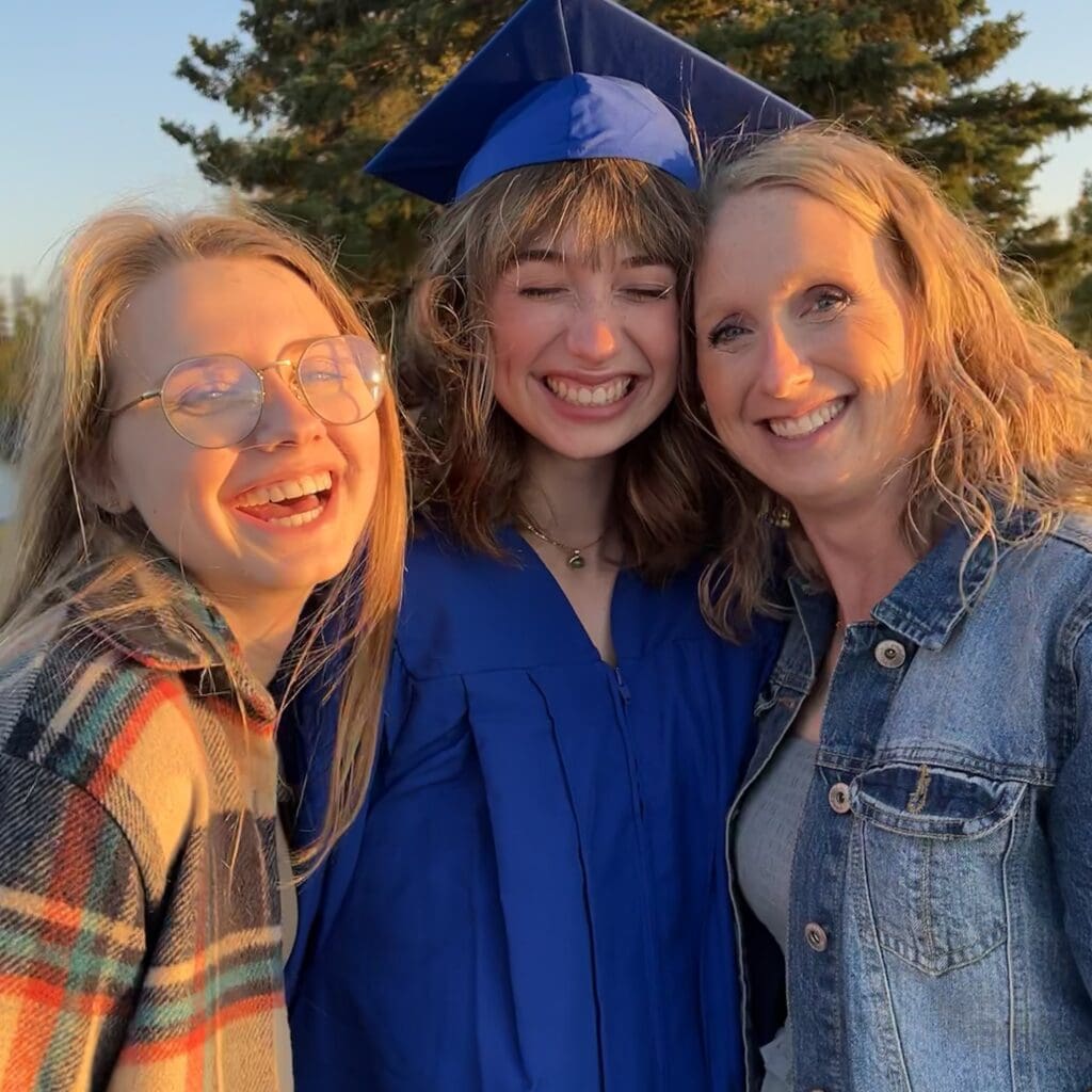Taylor Mccarthy with her mom and sister, celebrating being 
a Stenberg grad!