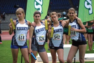 Janelle and her team on a competition. She credits sports to have helped her to excel academically.