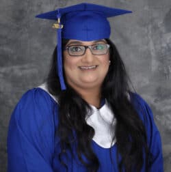 Lovee in her graduation cap and gown.