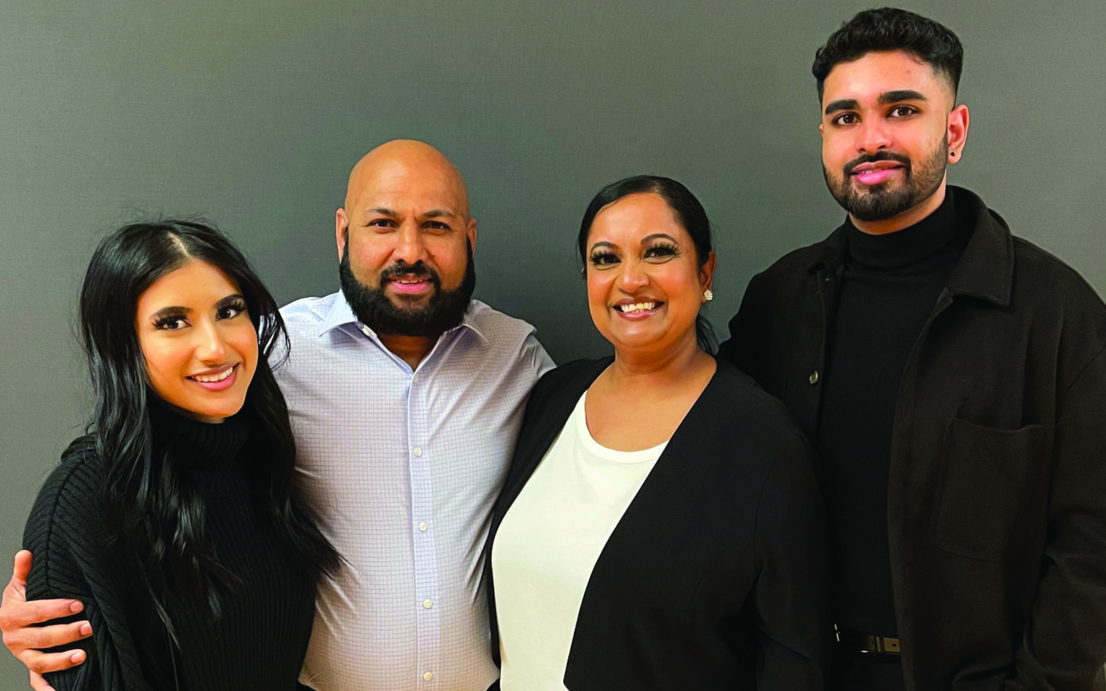 Bimal Naidu and her family celebrate her success.