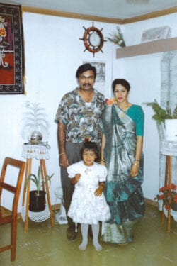 V and her parents in their house in Fiji. V felt safe in her home country, but it all changed when they moved to Canada.