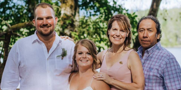 Anne with her husband Jes&uacute;s, at her daughter Holly&rsquo;s wedding with her husband Zach.